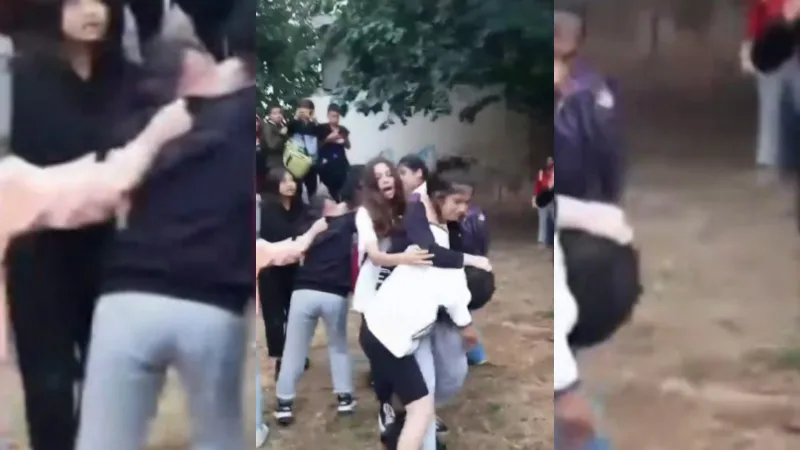 Ortaokul öğrencisi kızların saç saça kavgası kamerada