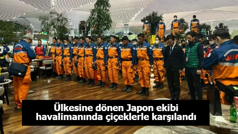 Ülkesine dönen Japon ekibi havalimanında çiçeklerle karşılandı