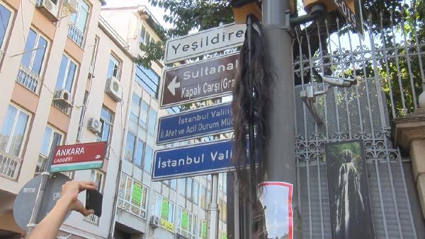 İranlı Mahsa Amini için 'saçtan bayraklı' protesto 